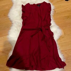 Darkish red ruffles arm and bottom